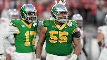 Jan 1, 2025; Pasadena, CA, USA; Oregon Ducks defensive lineman Derrick Harmon (55) reacts in the second half against the Ohio State Buckeyes in the 2025 Rose Bowl college football quarterfinal game at Rose Bowl Stadium. Mandatory Credit: Kirby Lee-Imagn Images