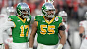 Jan 1, 2025; Pasadena, CA, USA; Oregon Ducks defensive lineman Derrick Harmon (55) reacts in the second half against the Ohio State Buckeyes in the 2025 Rose Bowl college football quarterfinal game at Rose Bowl Stadium. Mandatory Credit: Kirby Lee-Imagn Images