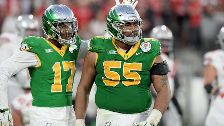 Jan 1, 2025; Pasadena, CA, USA; Oregon Ducks defensive lineman Derrick Harmon (55) reacts in the second half against the Ohio State Buckeyes in the 2025 Rose Bowl college football quarterfinal game at Rose Bowl Stadium. Mandatory Credit: Kirby Lee-Imagn Images Jan 1, 2025; Pasadena, CA, USA; Oregon Ducks defensive lineman Derrick Harmon (55) reacts in the second half against the Ohio State Buckeyes in the 2025 Rose Bowl college football quarterfinal game at Rose Bowl Stadium. Mandatory Credit: Kirby Lee-Imagn Images