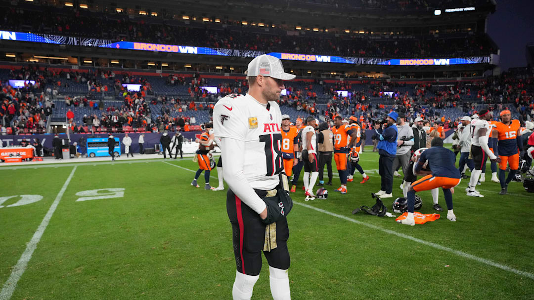 Nov 17, 2024; Denver, Colorado, USA; Atlanta Falcons quarterback Kirk Cousins (18) following the loss to the Denver Broncos at Empower Field at Mile High. Mandatory Credit: Ron Chenoy-Imagn Images