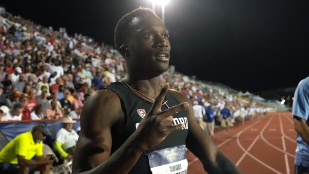 Udodi Onwuzurike of Stanford celebrates after winning the 200m 