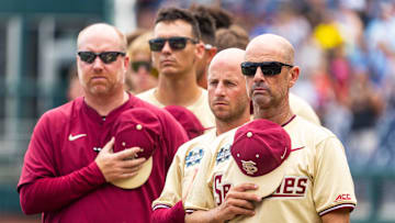 Jun 18, 2024; Omaha, NE, USA; Florida State Seminoles head coach Link Jarrett during the national anthem before the game against the North Carolina Tar Heels at Charles Schwab Field Omaha. Mandatory Credit: Dylan Widger-Imagn Images