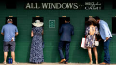 People place Kentucky Derby bets in the infield at Churchill Downs last year.