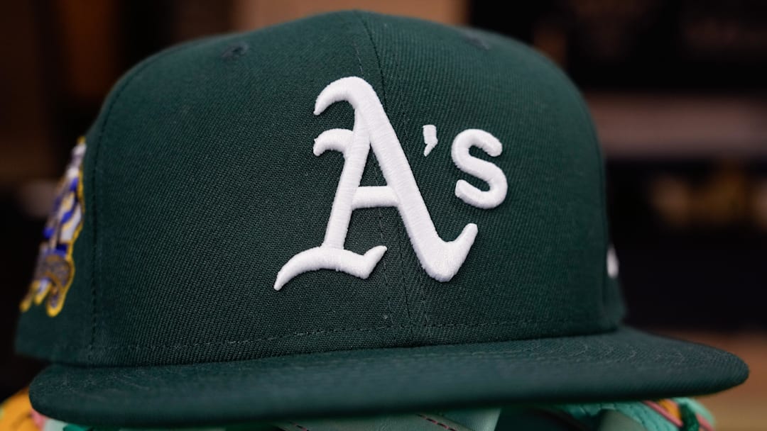Apr 18, 2025; Milwaukee, Wisconsin, USA; General view of an Athletics hat during batting practice before the game against the Milwaukee Brewers at American Family Field. Mandatory Credit: Jeff Hanisch-Imagn Images