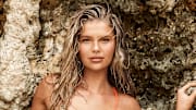 Ellie Thumann was photographed by Ben Watts in Bermuda. Swimsuit by Andi Bagus.