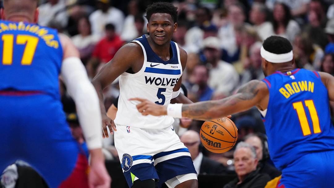 Mar 1, 2026; Denver, Colorado, USA; Minnesota Timberwolves guard Anthony Edwards (5) controls the ball in the second quarter against the Denver Nuggets at Ball Arena.