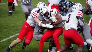 Nov 11, 2023; Boulder, Colorado, USA; Arizona Wildcats wide receiver Montana Lemonious-Craig (5) carries the ball in the fourth quarter against the Colorado Buffaloes at Folsom Field. Mandatory Credit: Ron Chenoy-Imagn Images