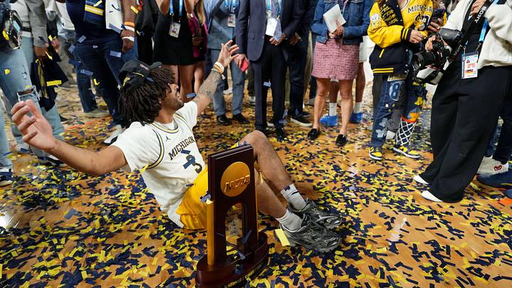 Apr 6, 2026; Indianapolis, IN, USA; Michigan Wolverines guard Elliot Cadeau (3) celebrates.
