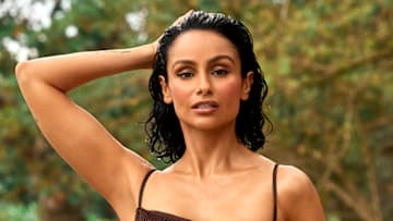 Nazanin Mandi was photographed by Yu Tsai in Jamaica. Swimsuit by LSPACE.