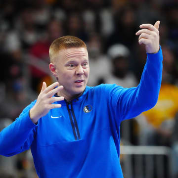 Nov 3, 2023; Denver, Colorado, USA; Dallas Mavericks assistant coach Sean Sweeney calls out in the second half against the Denver Nuggets at Ball Arena. Mandatory Credit: Ron Chenoy-USA TODAY Sports