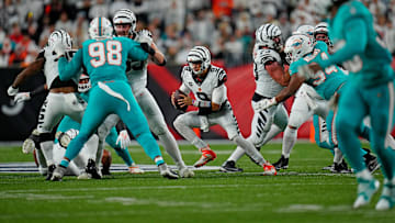 Cincinnati Bengals quarterback Joe Burrow (9) cuts right as he keeps the ball on a play in the second quarter of the NFL Week 4 game between the Cincinnati Bengals and the Miami Dolphins at PayCor Stadium in downtown on Thursday, Sept. 29, 2022.