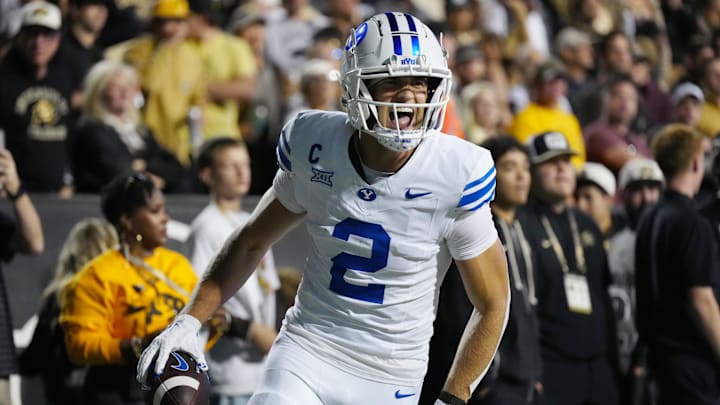 Sep 27, 2025; Boulder, Colorado, USA; Brigham Young Cougars wide receiver Chase Roberts (2) celebrates his touchdown reception in the second quarter against the Colorado Buffaloes at Folsom Field. Mandatory Credit: Ron Chenoy-Imagn Images