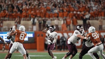 Nov 28, 2025; Austin, Texas, USA; Texas A&M Aggies quarterback Marcel Reed (10) throws a pass during the first half against the Texas Longhorns at Darrell K Royal-Texas Memorial Stadium. Mandatory Credit: Scott Wachter-Imagn Images