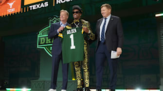 NFL commissioner Roger Goodell and Green Bay Packers president Mark Murphy with Texas Longhorns wide receiver Matthew Golden.