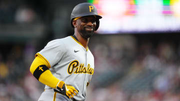 Jun 14, 2024; Denver, Colorado, USA; Pittsburgh Pirates outfielder Andrew McCutchen (22) reacts following his solo home run in the sixth inning at Coors Field. Mandatory Credit: Ron Chenoy-USA TODAY Sports