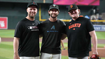 Sep 17, 2025; Phoenix, Arizona, USA; Arizona Diamondbacks pitchers Corbin Burnes, Zac Gallen, and San Francisco Giants pitcher Logan Webb pose for an image before a game at Chase Field. Mandatory Credit: Rick Scuteri-Imagn Images