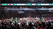 WWE Universal Championship match between Roman Reigns and Cody Rhodes during Wrestlemania XL.