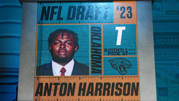 Apr 27, 2023; Kansas City, MO, USA; Oklahoma tackle Anton Harrison after being selected by the Jacksonville Jaguars