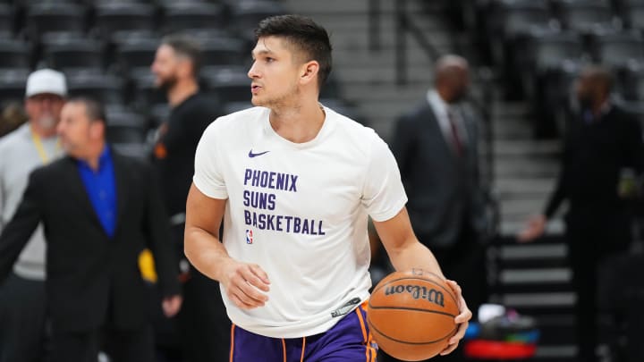 Mar 5, 2024; Denver, Colorado, USA; Phoenix Suns guard Grayson Allen (8) warms up before a game against the Denver Nuggets at Ball Arena. Mandatory Credit: Ron Chenoy-USA TODAY Sports