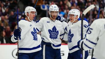 Dec 31, 2022; Denver, Colorado, USA; Toronto Maple Leafs left wing Pierre Engvall (47) celebrates