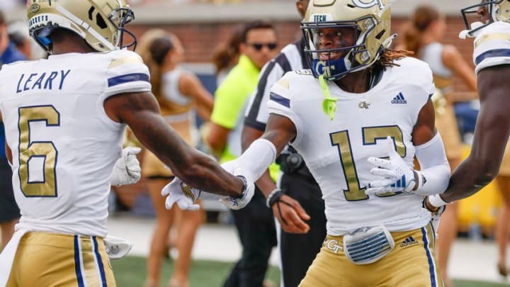 Georgia Tech Yellow Jackets wide receiver Eric Singleton Jr. (13) celebrates his first half touchdown with wide receiver Christian Leary (6) and wide receiver Abdul Janneh (18) during a football game against South Carolina State at Bobby Dodd Stadium in Atlanta on Saturday, September 9, 2023. (Bob Andres for the Atlanta Journal Constitution