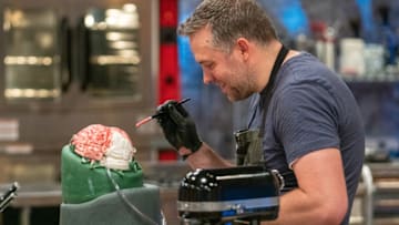 Peter Tidwell paints his brain as seen on Halloween Baking Championship Season 5 Episode 6. photo provided by Food Network