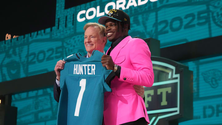 NFL commissioner Roger Goodell stands with Colorado Buffaloes wide receiver Travis Hunter after he is selected by the Jacksonville Jaguars. Mandatory Credit: Kirby Lee-Imagn Images