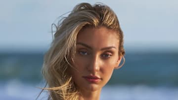 Cameron Brink was photographed by Ben Horton at The Boca Raton. Swimsuit by GIGI C. 