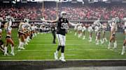 Dec 7, 2025; Paradise, Nevada, USA;  Las Vegas Raiders defensive end Maxx Crosby (98) takes the field prior to a game against the Denver Broncos at Allegiant Stadium. Mandatory Credit: Kirby Lee-Imagn Images