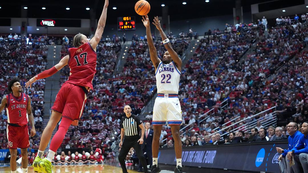 Mar 22, 2026; San Diego, CA, USA; Kansas Jayhawks guard Darryn Peterson (22) shoots against St. John's Red Storm forward Rubén Prey (17) in the second half during a second round game of the men's 2026 NCAA Tournament at Viejas Arena. Mandatory Credit: Kirby Lee-Imagn Images