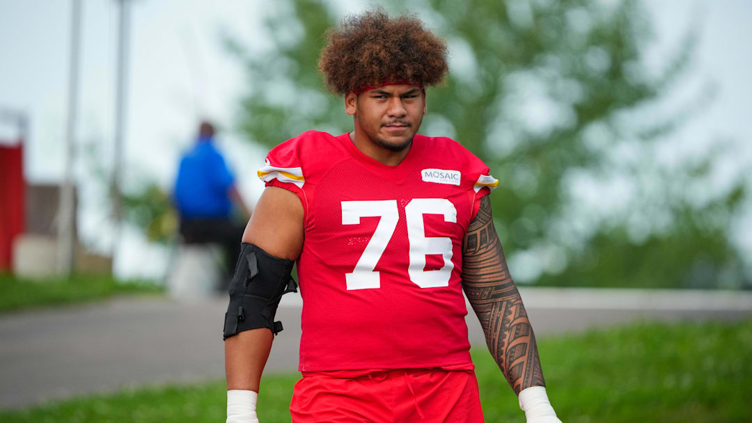 Jul 22, 2025; St. Joseph, MO, USA; Kansas City Chiefs offensive tackle Kingsley Suamataia (76) walks down the hill to the practice fields during training camp at Missouri Western State University. Mandatory Credit: Denny Medley-Imagn Images