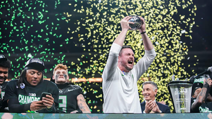 Oregon Ducks head coach Dan Lanning celebrates Saturday, Dec. 7, 2024, during the Big Ten Championship game between the Oregon Ducks and the Penn State Nittany Lions at Lucas Oil Stadium in Indianapolis. The Ducks defeated the Nittany Lions, 45-37. Oregon Ducks head coach Dan Lanning celebrates Saturday, Dec. 7, 2024, during the Big Ten Championship game between the Oregon Ducks and the Penn State Nittany Lions at Lucas Oil Stadium in Indianapolis. The Ducks defeated the Nittany Lions, 45-37.