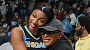 Angel Reese and Teresa Weatherspoon hugged after the Sky beat the Liberty in New York.