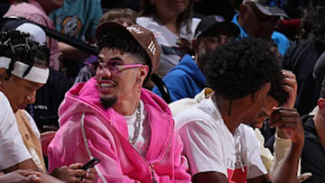 LaMelo Ball sat courtside for the Hornets Summer League game on Friday in Las Vegas.