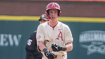 Gabe Fraser on the bases against Charlotte on March 2 for the Arkansas Razorbacks 