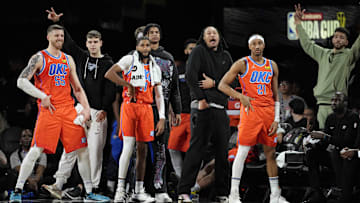 Dec 14, 2024; Las Vegas, Nevada, USA; The Oklahoma City Thunder bench reacts during the fourth quarter against the Houston Rockets in a semifinal of the 2024 Emirates NBA Cup at T-Mobile Arena. Mandatory Credit: Kyle Terada-Imagn Images