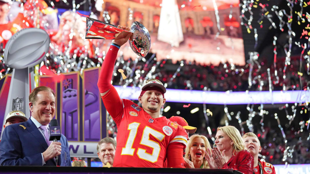 Feb 11, 2024; Paradise, Nevada, USA; Kansas City Chiefs quarterback Patrick Mahomes (15) holds the Vince Lombardi Trophy after winning Super Bowl LVIII against the San Francisco 49ers at Allegiant Stadium. Mandatory Credit: Kirby Lee-USA TODAY Sports