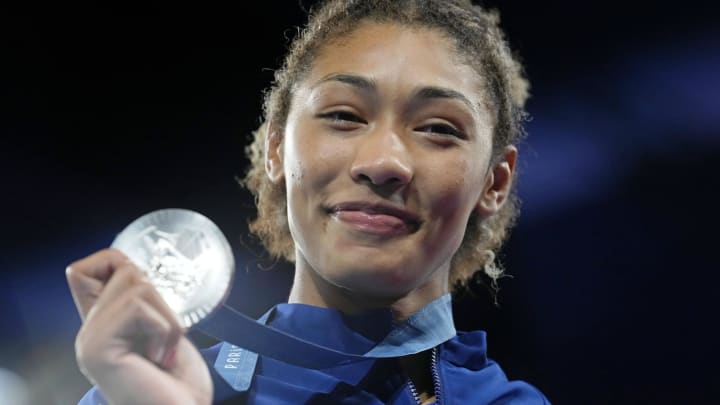 Aug 11, 2024; Paris, France; Kennedy Alexis Blades (USA) celebrates her silver medal in womenís freestyle 76kg during the Paris 2024 Olympic Summer Games at Champ-de-Mars Arena. Mandatory Credit: Grace Hollars-USA TODAY Sports