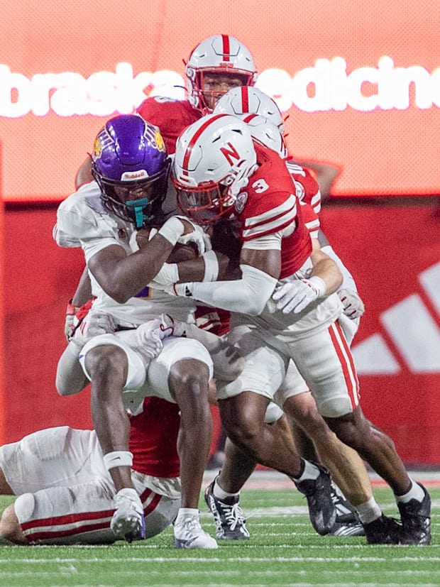 Nebraska defensive back Marques Buford Jr. brings down Northern Iowa wide receiver Sergio Morancy.