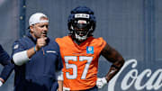 Jul 24, 2025; Englewood, CO, USA; Denver Broncos inside linebackers coach Jeff Schmedding with linebackers Levelle Bailey (56), Justin Strnad (40), Drew Sanders (41), Dre Greenlaw (57), and Alex Singleton (49) during Denver Broncos Training Camp