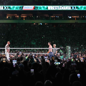 Apr 7, 2024; Philadelphia, PA, USA; The Rock and John Cena interfere during the main event.