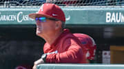 Arkansas Razorbacks coach Dave Van Horn in the dugout against the Portland Pilots at Baum-Walker Stadium in Fayetteville, Ark.
