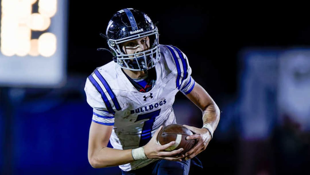 Gilmer Union Hill's EJ Mowery runs the ball in a game against Saint Jo. 