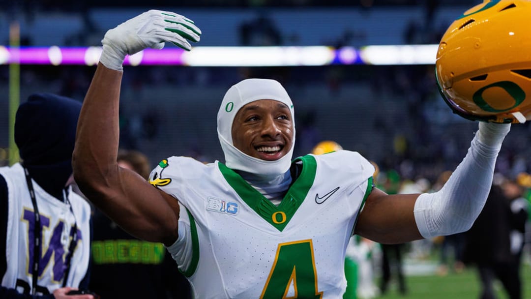 Oregon Ducks Washington Huskies dan lanning rivalry college football playoff dante moore malik benson touchdown transfer