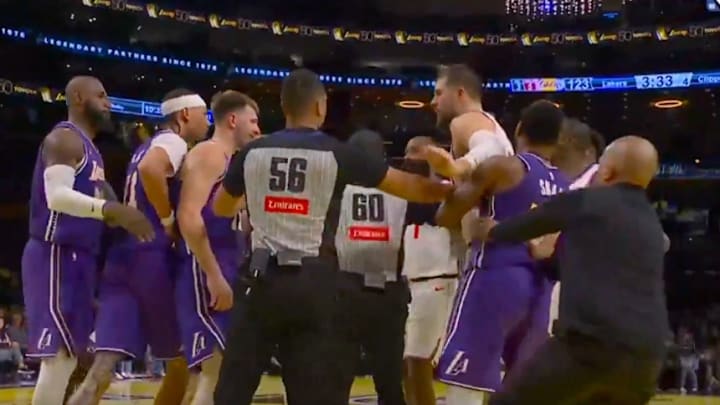 Lakers and Clippers players scuffle in NBA Cup action.