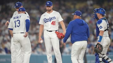 Aug 4, 2025; Los Angeles, California, USA;  Los Angeles Dodgers manager Dave Roberts (30) relieves Los Angeles Dodgers pitcher Brock Stewart (41) in the ninth inning during an MLB game against the St. Louis Cardinals at Dodger Stadium. Mandatory Credit: Kirby Lee-Imagn Images