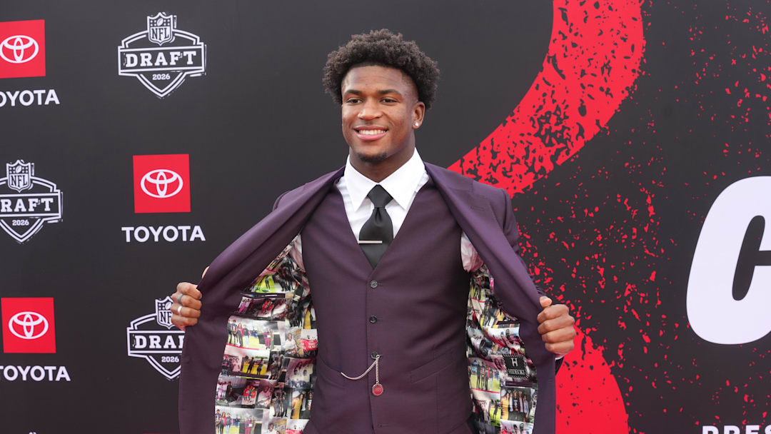 Apr 23, 2026; Pittsburgh, PA, USA;Ohio State Buckeyes defensive back Caleb Downs poses on the red carpet before the 2026 NFL Draft at Point State Park. Mandatory Credit: Kirby Lee-Imagn Images