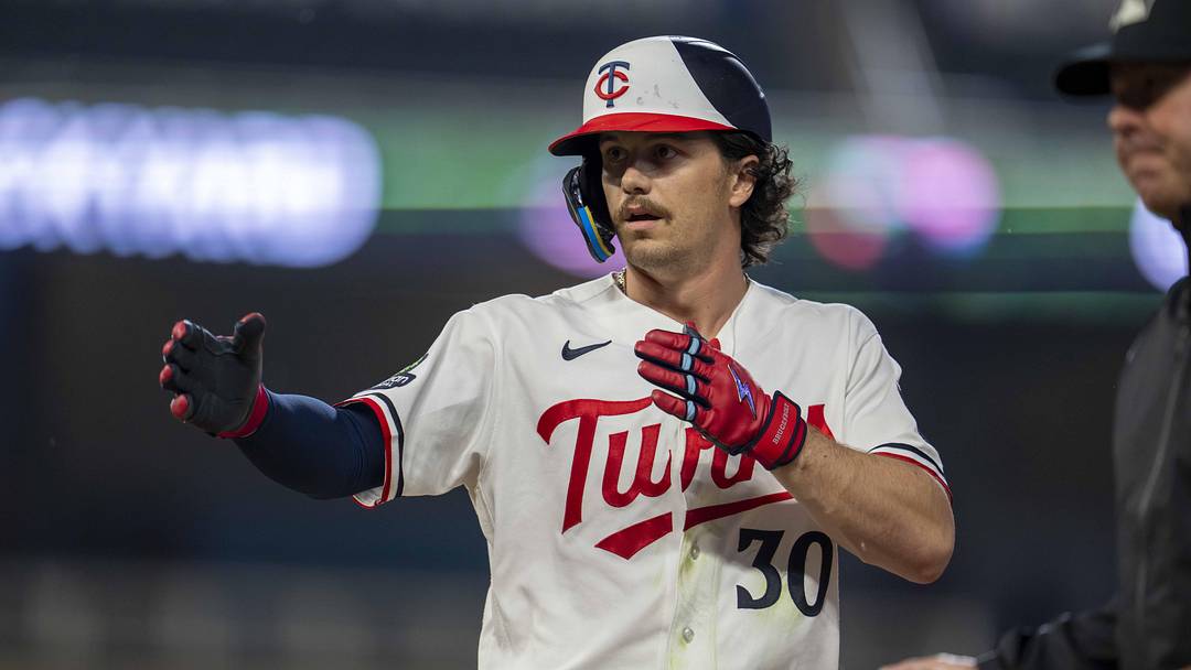 May 18, 2026; Minneapolis, Minnesota, USA; Minnesota Twins center fielder James Outman (30) celebrates hitting a single against the Houston Astros in the fifth inning at Target Field. Mandatory Credit: Jesse Johnson-Imagn Images
