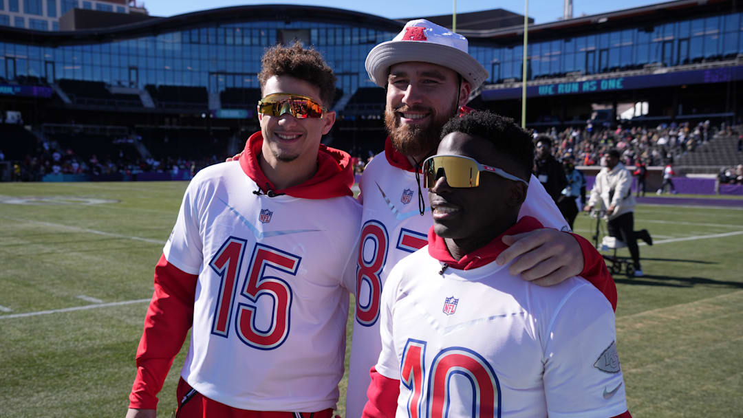 Feb 3, 2022; Las Vegas, NV, USA; Kansas City Chiefs quarterback Patrick Mahomes (15), tight end Travis Kelce (87) and receiver Tyreek Hill (10) pose Nduring AFC practice for the Pro Bowl at Las Vegas Ballpark.  Mandatory Credit: Kirby Lee-Imagn Images