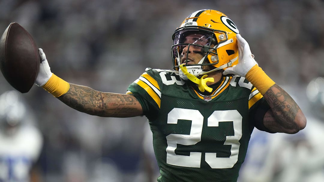 Jan 14, 2024; Arlington, Texas, USA; Green Bay Packers cornerback Jaire Alexander (23) reacts after intercepting a pass during the first quarter of the wild card playoff game against the Dallas Cowboys Sunday, January 14, 2024 at AT&T Stadium in Arlington, Texas. Mandatory Credit: Mark Hoffman-Imagn Images